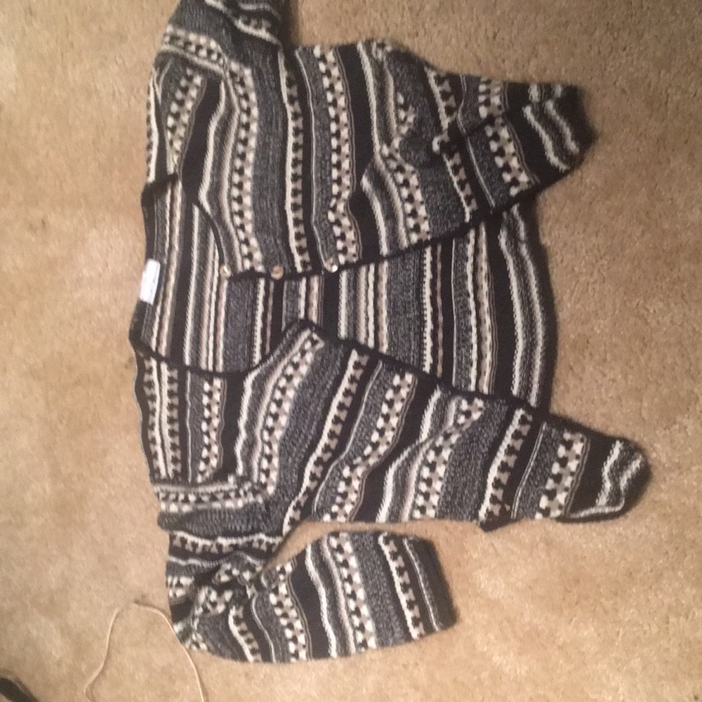 Striped 100% acrylic sweater.